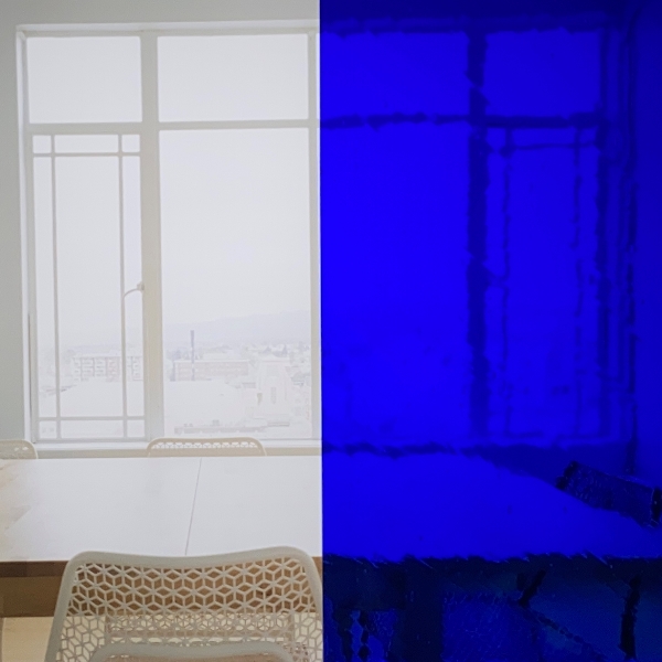 Blue Lamberts flashed glass on a clear base shown against a window